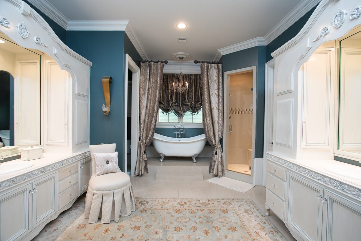 Primary bath with soaking tub and blue walls