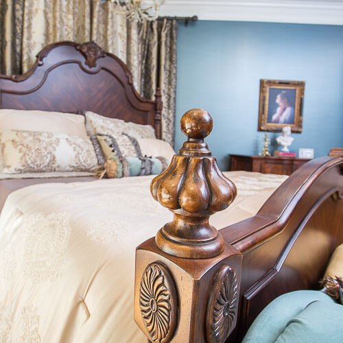 Primary bedroom with upholstered headboard